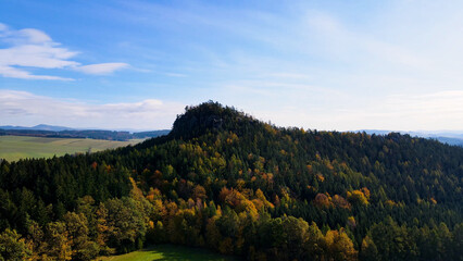Obraz premium autumn landscape view from above hill forest