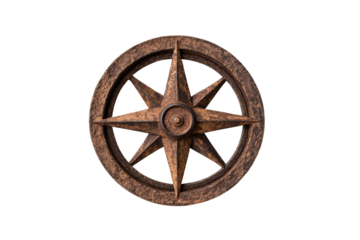 Rustic iron compass rose on black background showcasing vintage navigation symbol, cut out