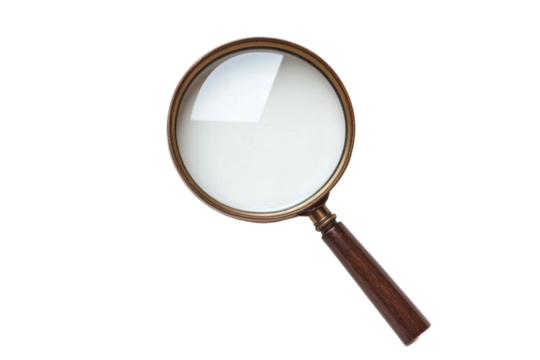 Antique wooden magnifying glass with brass frame on black background, cut out