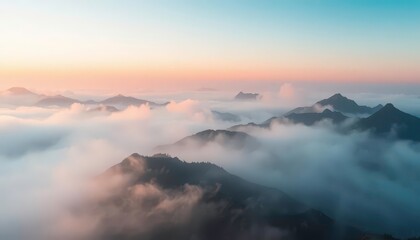 Fototapeta premium Misty peaks bathed in ethereal dawn light, creating a serene, mystical atmosphere, atmospheric, fog