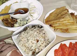 Variety of dishes served at a festive gathering featuring traditional foods