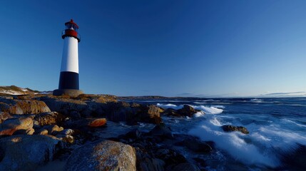 Obraz premium A tall, painted lighthouse stands majestically on a rugged shoreline, surrounded by crashing waves and boulders, with the sun setting in the background, casting a tranquil glow