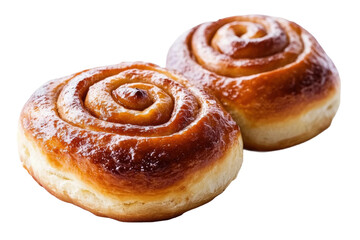 Delicious freshly baked cinnamon rolls with glazed swirls, cut out