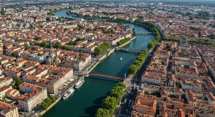 Fototapeta premium Aerial View of Cityscape with River - Stunning aerial shot of a city with a river winding through it, showcasing architecture and bridges