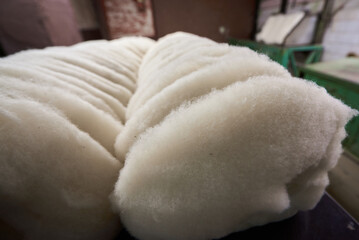 Felt production process reveals the soft texture and craftsmanship behind the art of creating high-quality felt materials in the workshop