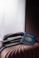International passport of a citizen of Mexico on a suitcase