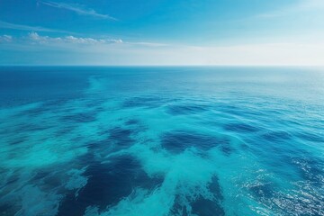 Obraz premium Tranquil Blue Ocean View with Soft Aqua Waters for Branding and Digital Use