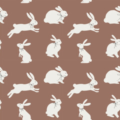 Vector minimalist seamless Easter pattern with white rabbit, bunny silhouettes on a warm Mocha Mousse background. For fabric, packaging with seam. Easterstide wallpaper. Bunnies illustration