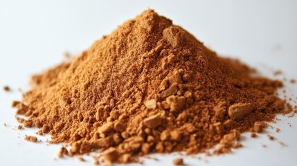 Brown Powder Pile on White Background