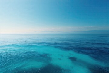 Fototapeta premium Tranquil Blue Ocean View with Soft Aqua Waters for Branding and Digital Media