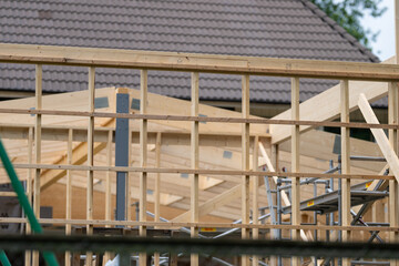 Second floor of a wooden house under construction.