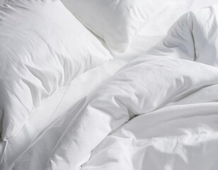 Crisp white bedding with cozy pillows and soft duvet in sunlit room