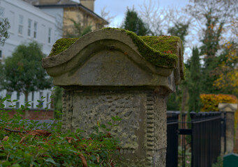 Weathered Stone Pillar with Moss Covered Cap