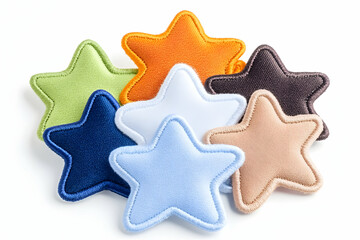 Obraz premium Colorful fabric stars clustered on white background