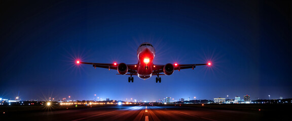 Airplane taking off at night with glowing runway lights, dynamic motion