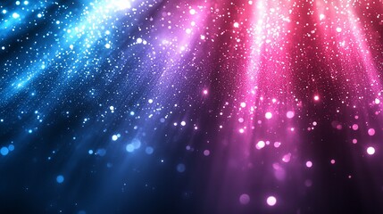 Sparkling glitter lights, blue and pink rays on dark background.