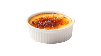Close up shot of a creme brulee in a white ramekin against a black background in studio lightisolated on transparent background	