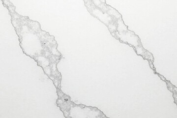 Subtle veining on smooth white marble surface, grey veins, white marble texture
