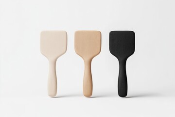 Three  wooden hair styling brushes in neutral colors