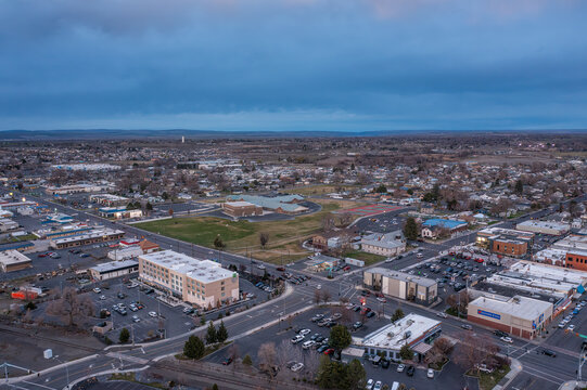 Aerial drone photo of the Eastern Oregon town of Hermiston at dusk.