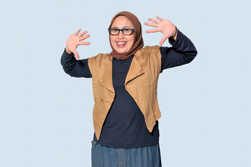 Naklejka premium Cheerful Muslim Woman Posing with Excited Expression