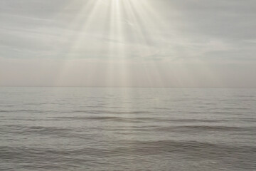Sunrays over sea at dusk