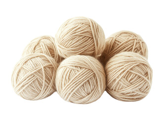 Set of natural beige yarn balls neatly arranged isolated on a transparent background