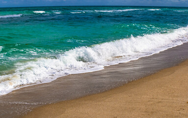 Golden beach, ocean waves, close up, Miami, USA