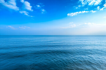 Fototapeta premium Calm ocean under a blue sky, peaceful seascape, travel background