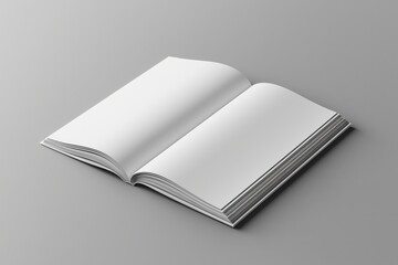 Open book with blank pages on a gray surface