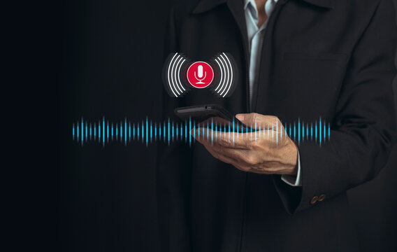 Businessman hand using smartphone to listen podcast or music.
