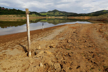 Low level of water is measured by a gauge in a reservoir dam during a severe drought in Sao Paulo, Brazil.