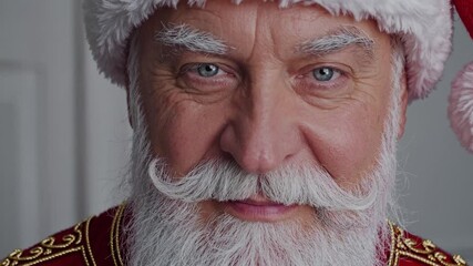 Jolly santa claus closeup: expressive holiday cheer in santa costume