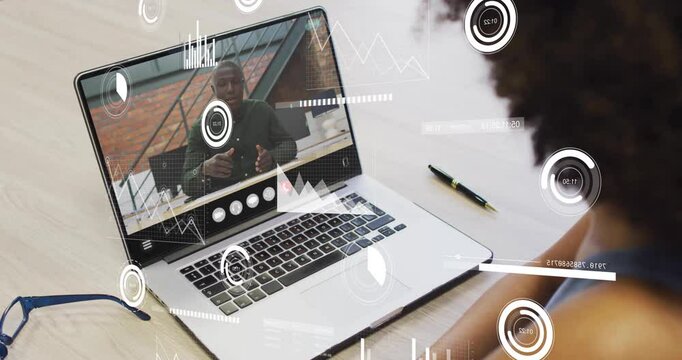 Using animation, person in video call with data analytics on laptop screen - Powered by Adobe