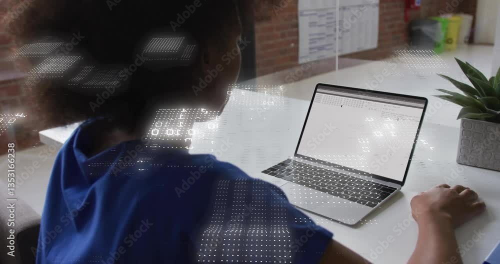 Poster person working on laptop with digital data processing animation overlay