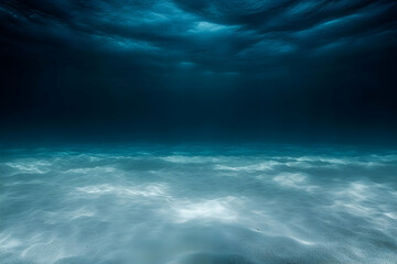 Fototapeta premium Underwater ocean sand, dark blue light, background texture