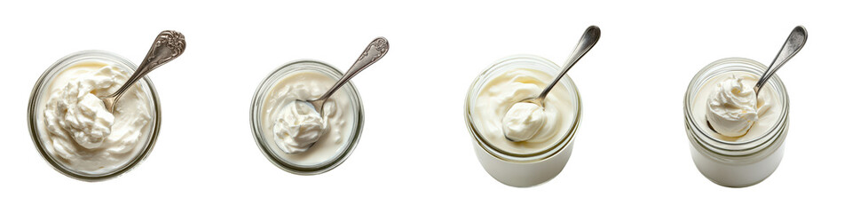 Overhead view Jars of creamy white yogurt with silver spoons ready to eat arranged in a horizontal line