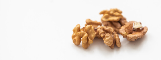 Half a walnut isolate. Peeled walnut on white. Walnut top view. Set with clipping path. Full depth of field