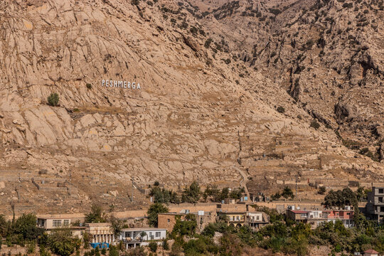 Big sign PESHMERGA above Akre town, Kurdistan Region of Iraq