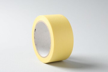One masking tape on grey background, closeup