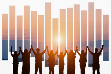 Silhouette of happy business teamwork making high hand over head standing back side on sunrise background, friendship,victory,cooperation,achievement,copy space.