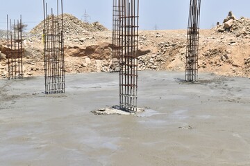Concrete Foundation with Rebar Columns at Construction Site