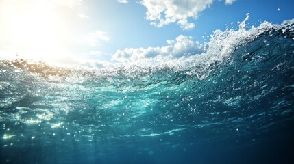 wave cresting with sunlight and sky visible.