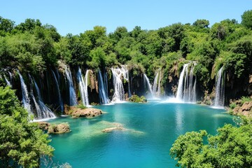 Fototapeta premium A picturesque waterfall cascades into a serene turquoise pool, surrounded by lush greenery under a clear blue sky.