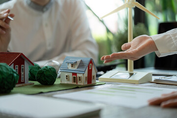 Energy Efficiency and Renewable Resources. Pro professionals evaluating sustainable home solutions.