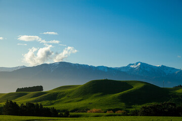 New Zealand Scenic Landscapes – Majestic Mountains with Snow & Rolling Green Hills and Pacific Ocean, Sunset in Kaikoura