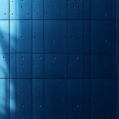 Fototapeta premium Blue metal panel wall, sunlit, modern building, architectural texture