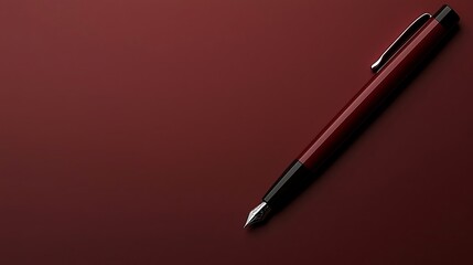 Elegant fountain pen on burgundy backdrop for writing, journaling and calligraphy projects