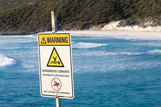 Sign warning of dangerous currents at beach