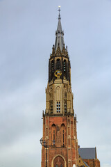 Europe, Netherlands, South Holland, Delft. Exterior steeple and clock tower of  Nieuwe Kerk (New Church).